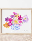 Blue and White vase filled with bright dahlia flowers of different varieties. Colors used: purple, lilac, magenta, pink, yellow, royal blue, light blue, orange