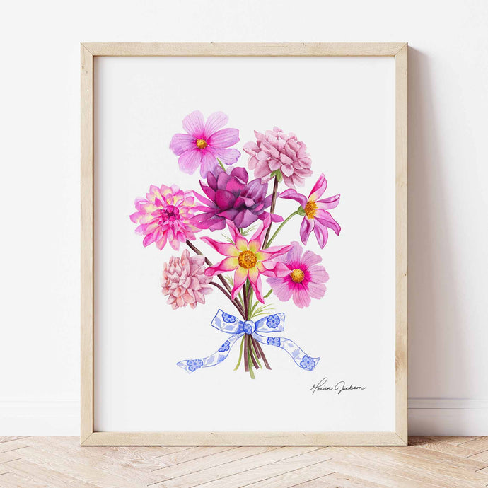Dahlia and cosmo bouquet tied together with a blue and white bow. colors featured are purples, fuscia, dusty rose, yellows, and blue and white
