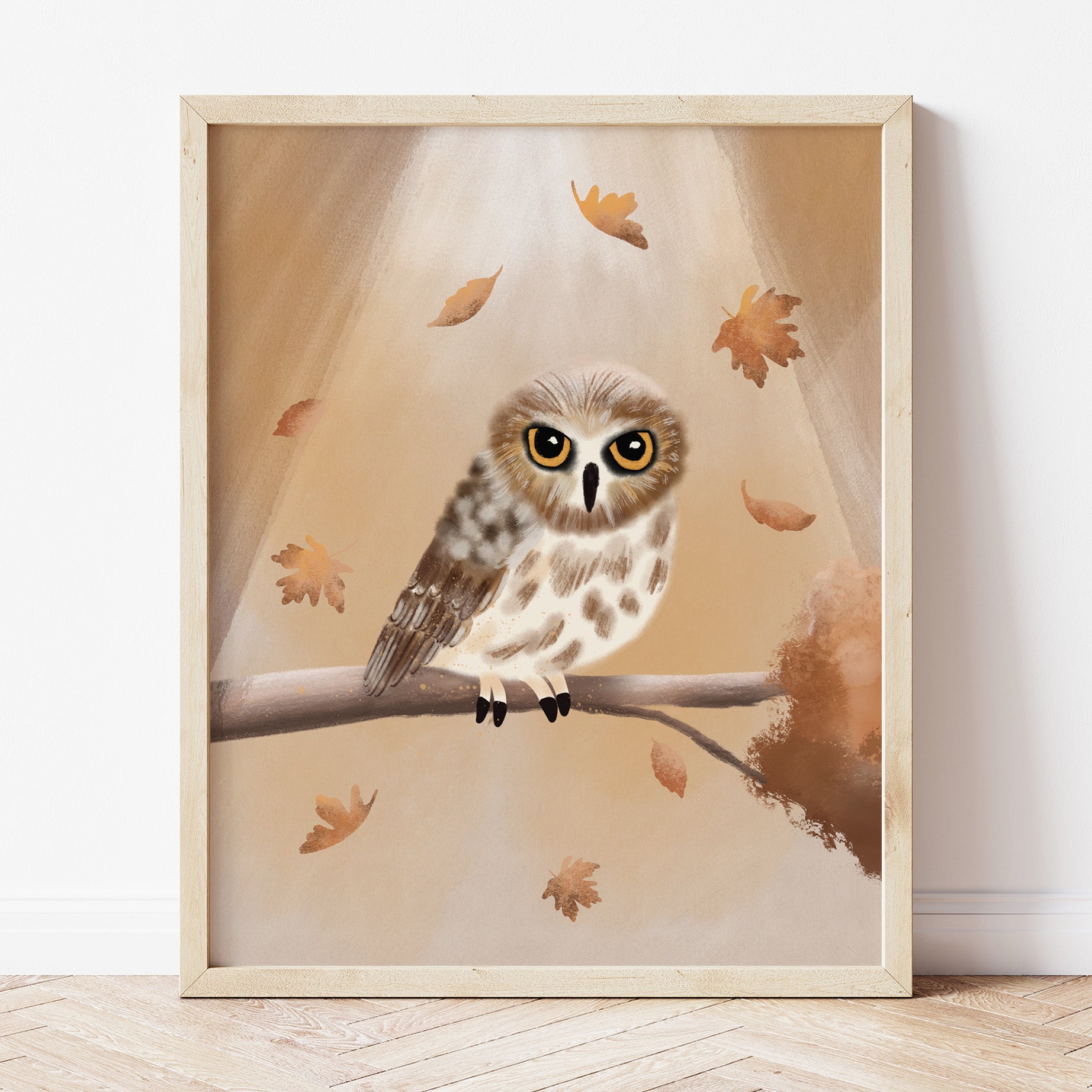 Art Print of a northern saw whet owl on a tree branch surrounded by fall leaves