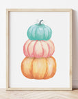 Painting of Stacked Pumpkins in Orange, Pink, and Teal. The paint texture gives it Rustic, elegant vibe!